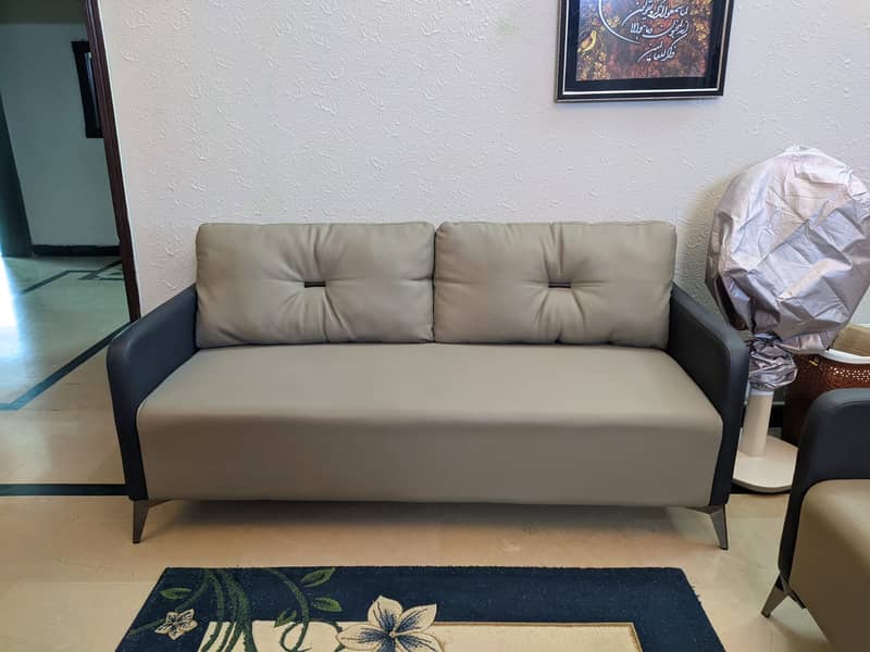 Almost new 5 Seater leather Sofa 1