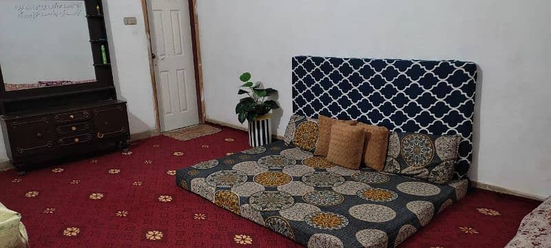 A full room size carpet and wooden dressing Table is available 0