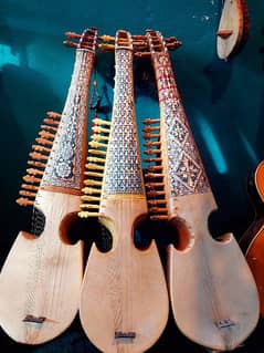 Rabab with extra strings and pick(half sadaf rubab, full sadaf robab)