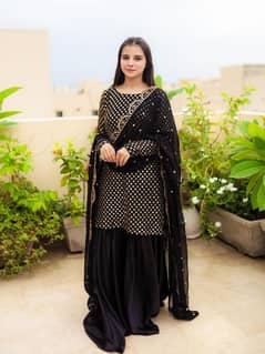 Stunning Black chiffon sequins embroidered gharara -shirt set. 3pieces