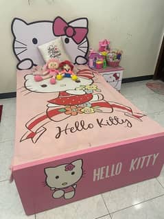 Baby girls bed (Hello Kitty) along with dressing table and side table