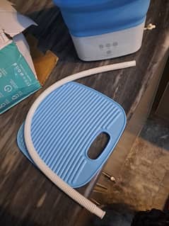 Portable folding washing machine