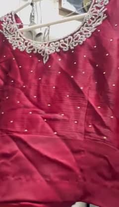 maroon saree embellished with silver work