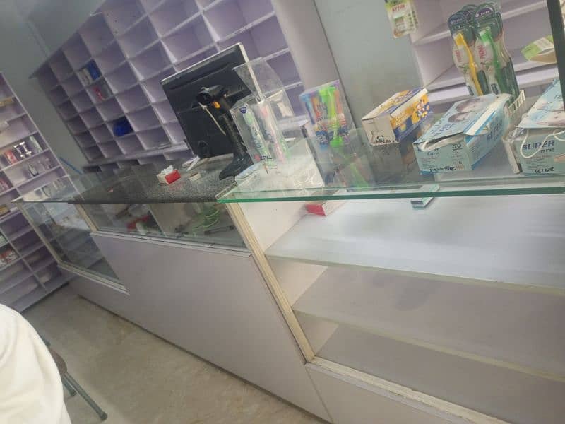 Racks counter and front glass available for sale 5