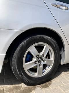 15 inch original honda rims with brand new tyres.