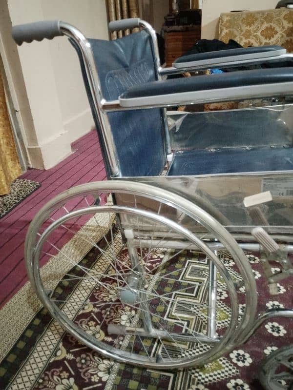 2 week used wheel chair 10/10 condition & foldable 3