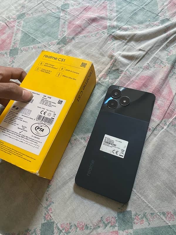 realmi c51 10/10 with box pani main girny ki waja sy koi ic bany gi 0