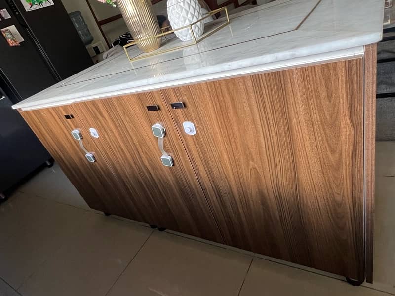 kitchen island with spacious cupboards 1