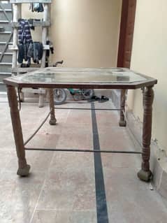 one Table Iron made heavy glass at the top