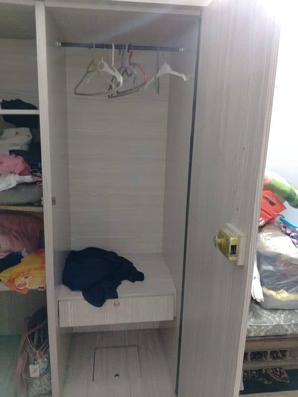 Queen Bed+ 2 Door wardrobe+ Iron stand 3