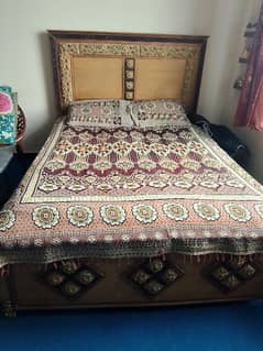 Wooden bed and dressing table