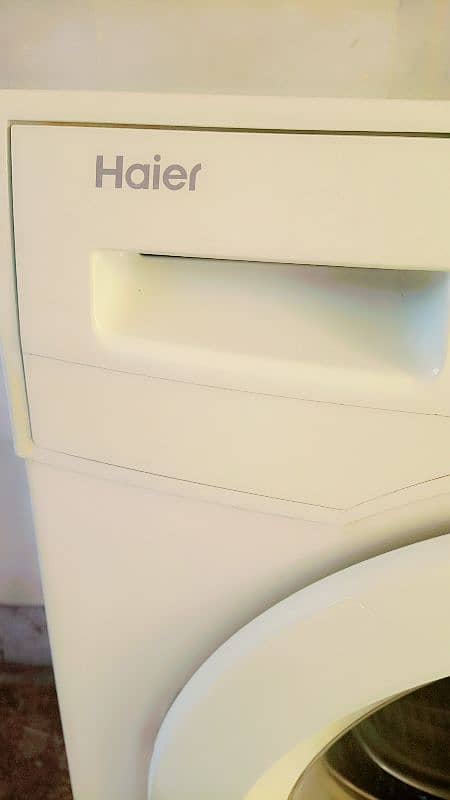 Haier front load auto machine 7kg 3