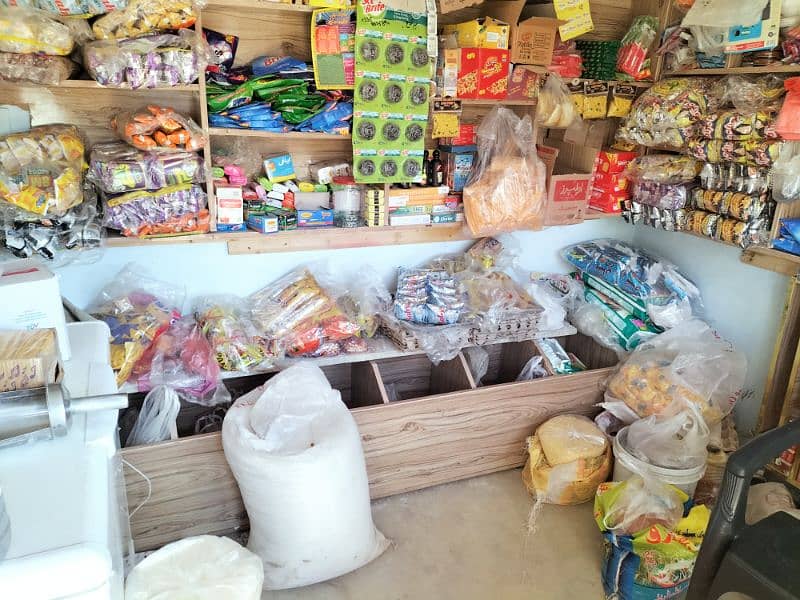 Urgent sells Freezer and wooden Almari of Shop 1