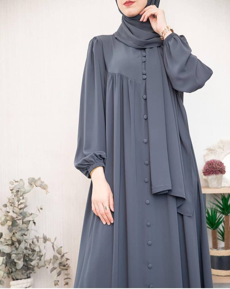 Abaya with stroller 1