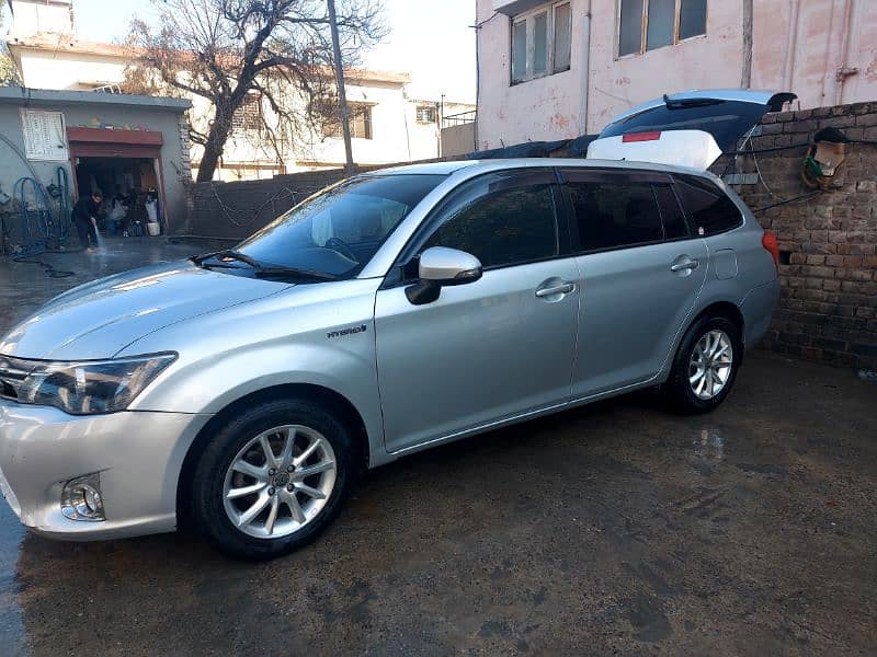 Toyota Corolla fielder hybrid 2014 model 9