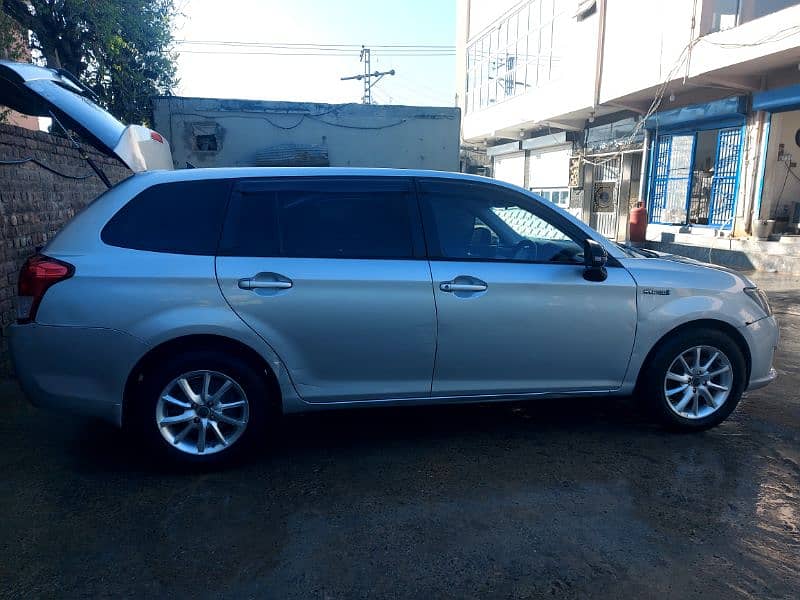 Toyota Corolla fielder hybrid 2014 model 10