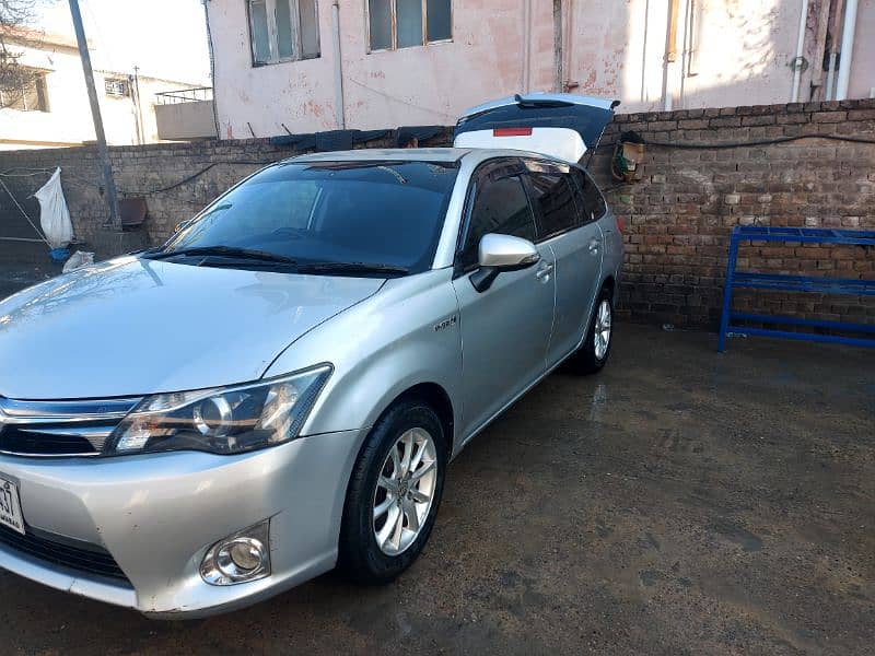 Toyota Corolla fielder hybrid 2014 model 12