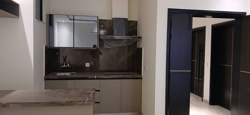 Brand New Semi Furnished 1 Bed Apartment available for rent in Gulberg III Lahore 3