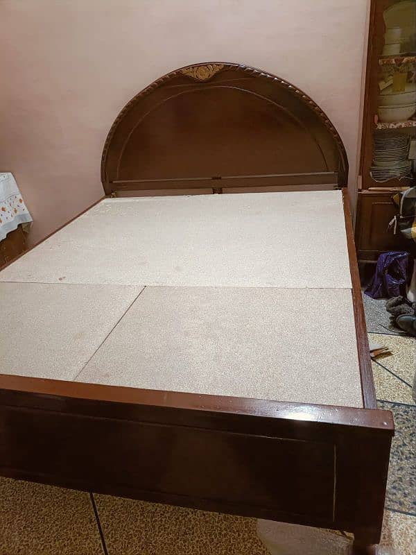 wooden double bed 0