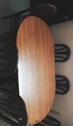 wooden dining table with 6 chairs