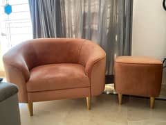 Sofa and tufted stool