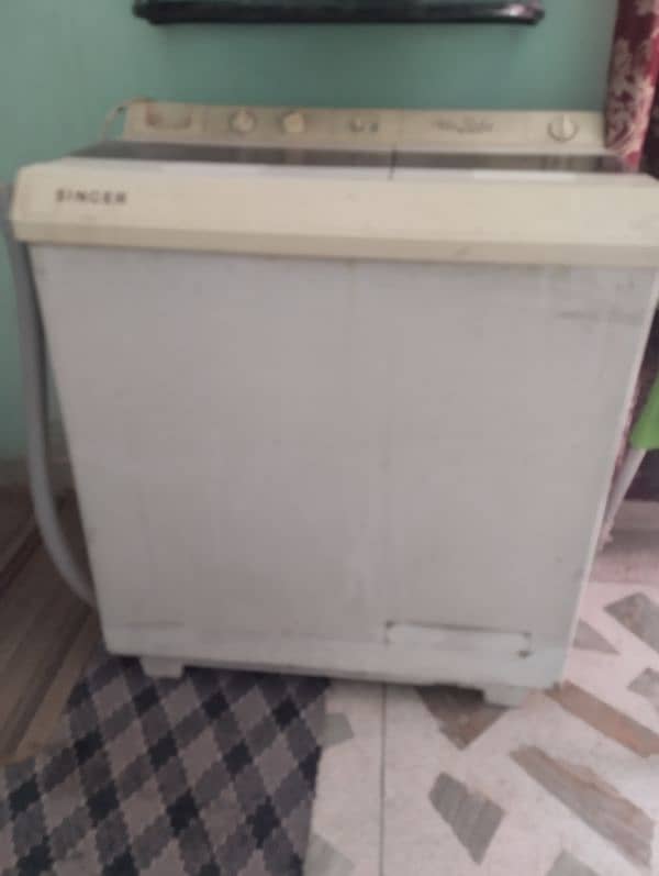 Singer Washing machine and dryer 1