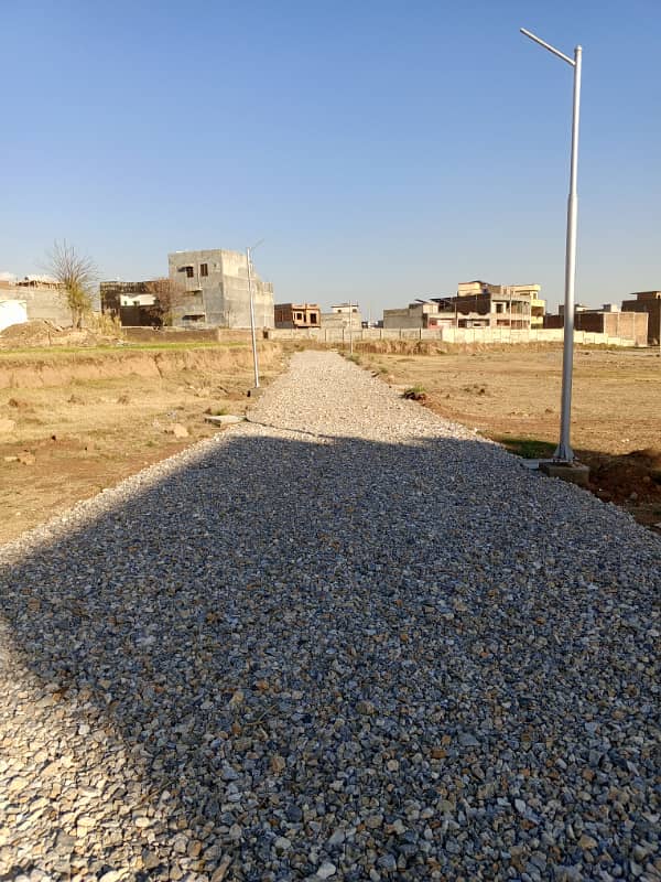 MARWA TOWN 25 kinal 9 Lack Pr Marla Plot Registery intiqal 5 Marla or 1 kinal Tak PLOT available Tahir Khan 03115850472 7