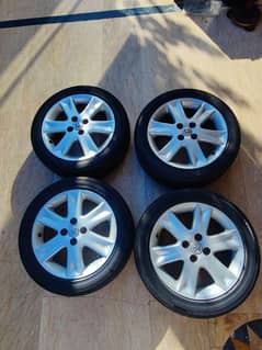 16 inches 4 nut japanese original rims with low profile tyres