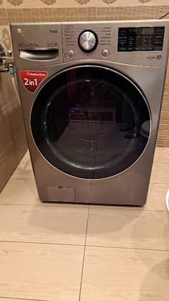 Lg new condition front load wash and dry 15/18 kg