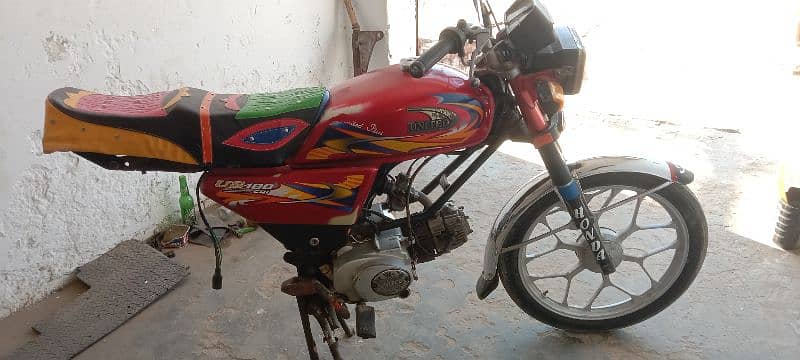 united 100 cc 5