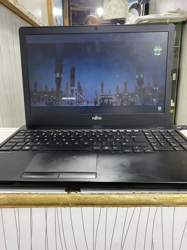 Fajistu Laptop  core i 3 5th generation 8 gb ram 128 ssd loke new lush 1