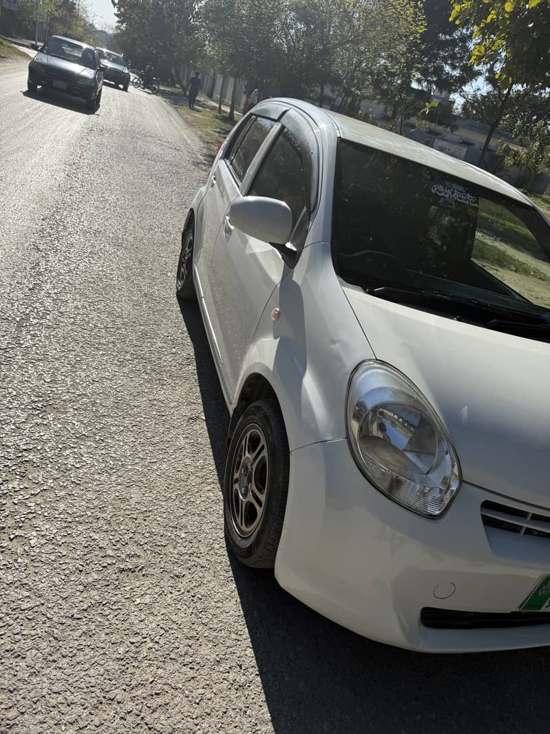 Toyota Passo 2011/15 1