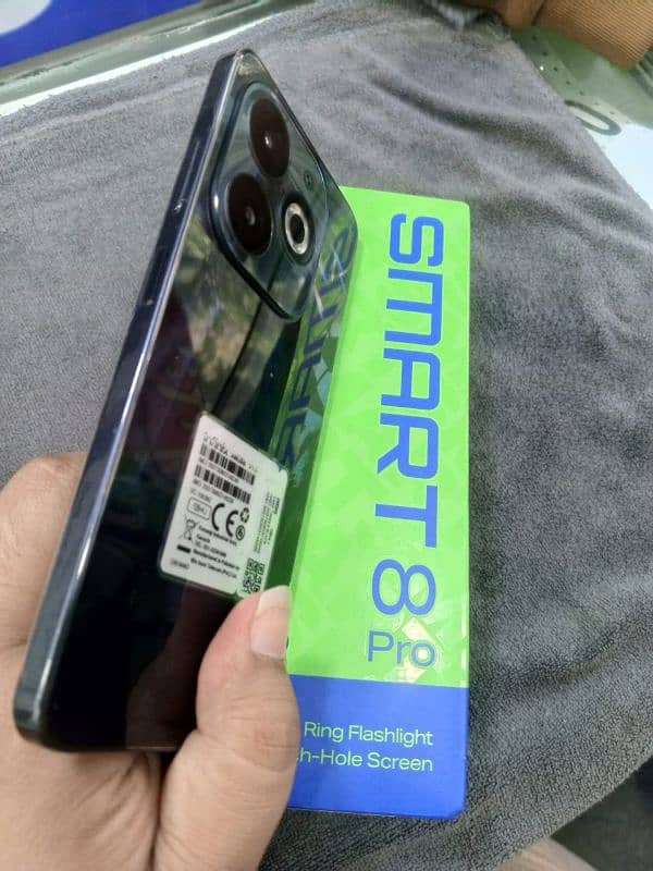 infinix smart 8 pro 4 128 with box and charger 1