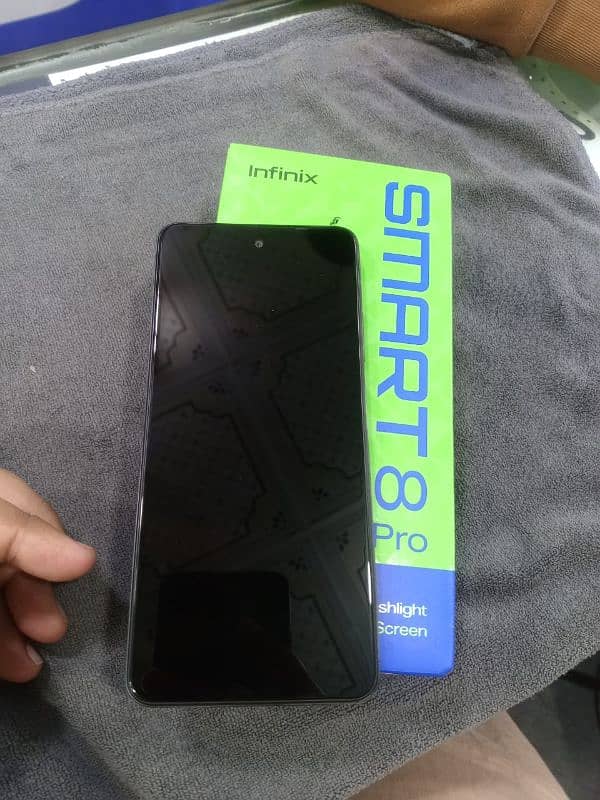 infinix smart 8 pro 4 128 with box and charger 2