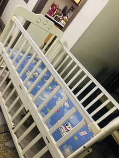 baby cot available for sale with matteress