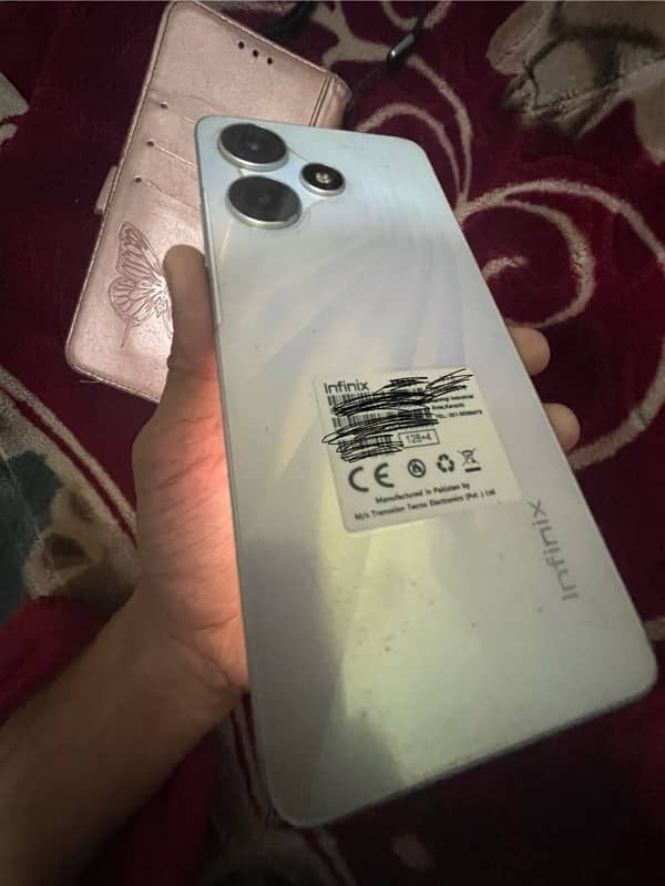 infinix hot 30 with box and charger 10/10 condition 0