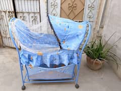 Mother care blue iron rod baby cot