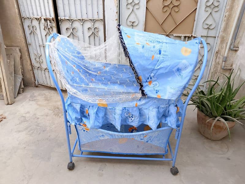 Mother care blue iron rod baby cot 1