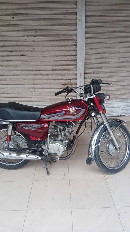 Honda 125.  CALL "_03295579019 0