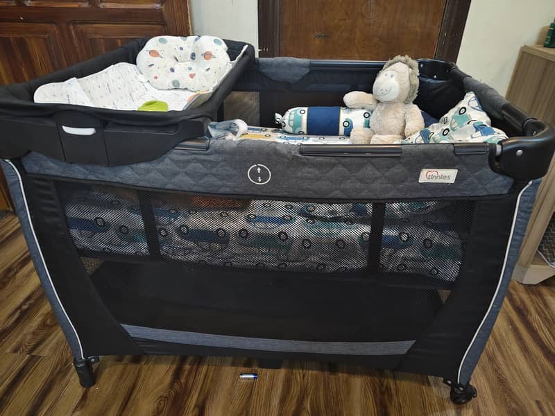 TINNIES COT for sale along with separately purchased mattress 1