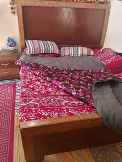 Double bed with one side table