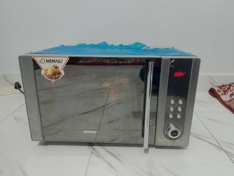 Homage microwave oven 2 in 1 use like new condition All ok h 0