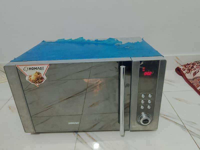 Homage microwave oven 2 in 1 use like new condition All ok h 1