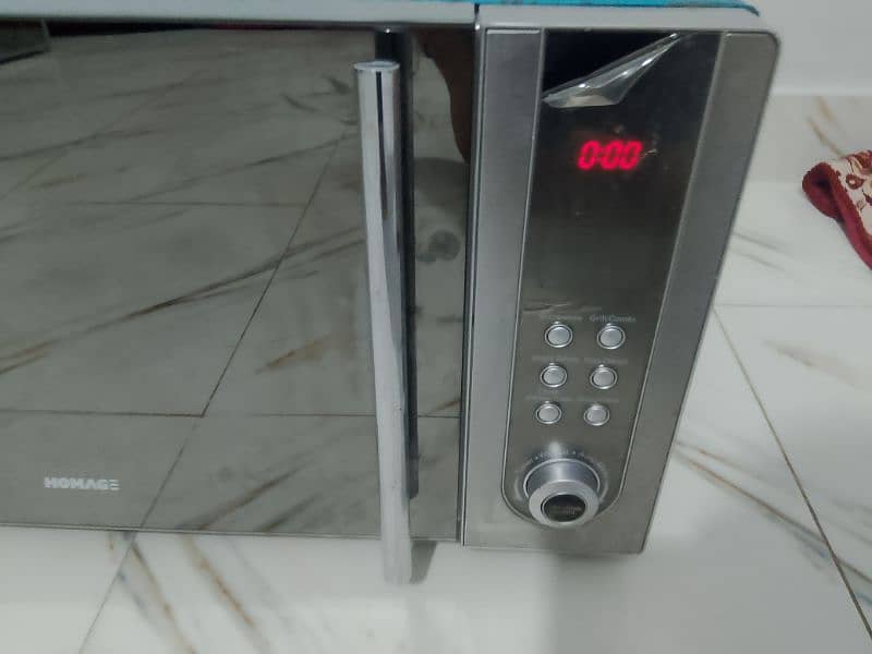 Homage microwave oven 2 in 1 use like new condition All ok h 4