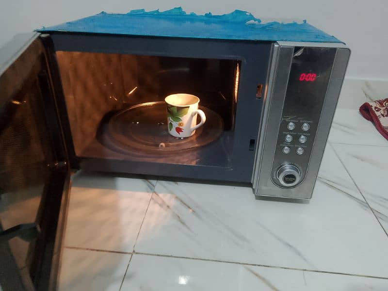 Homage microwave oven 2 in 1 use like new condition All ok h 7