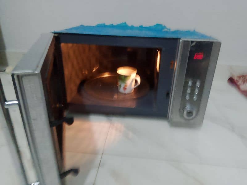 Homage microwave oven 2 in 1 use like new condition All ok h 8