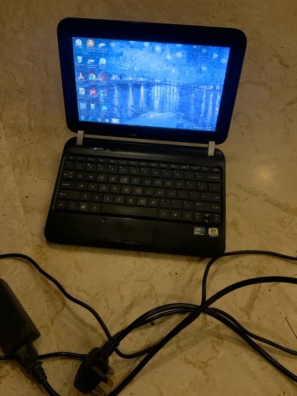 HP mini Laptop with Charger for sale. 1