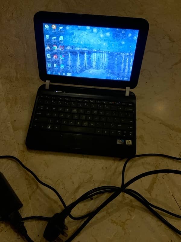 HP mini Laptop with Charger for sale. 2