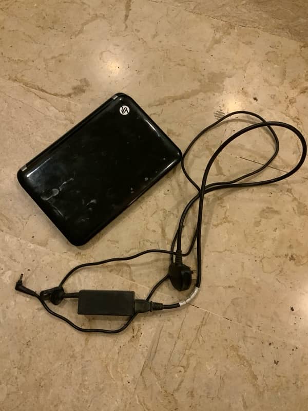 HP mini Laptop with Charger for sale. 4