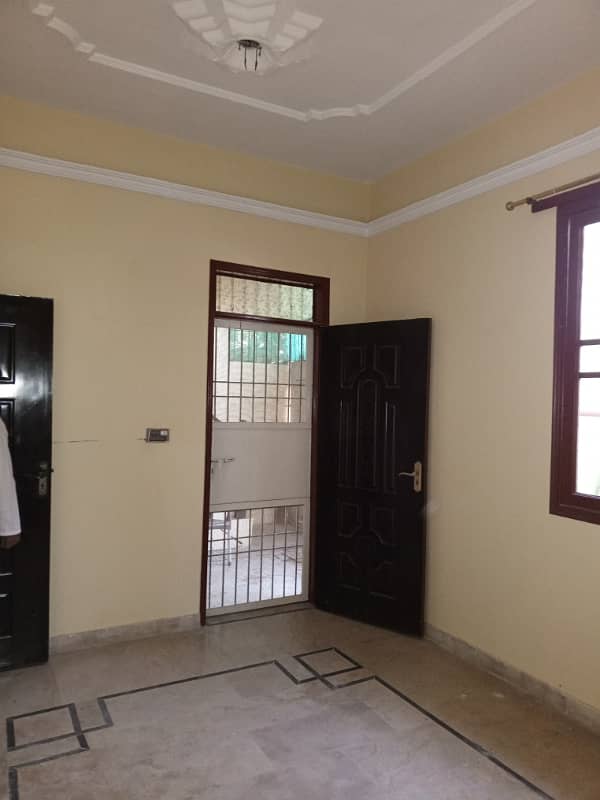 Portion for rent 2 bed dd in block 12 gulistan e johar 0